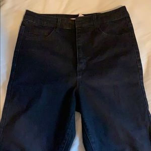 Black pants with slight fringes at the bottom